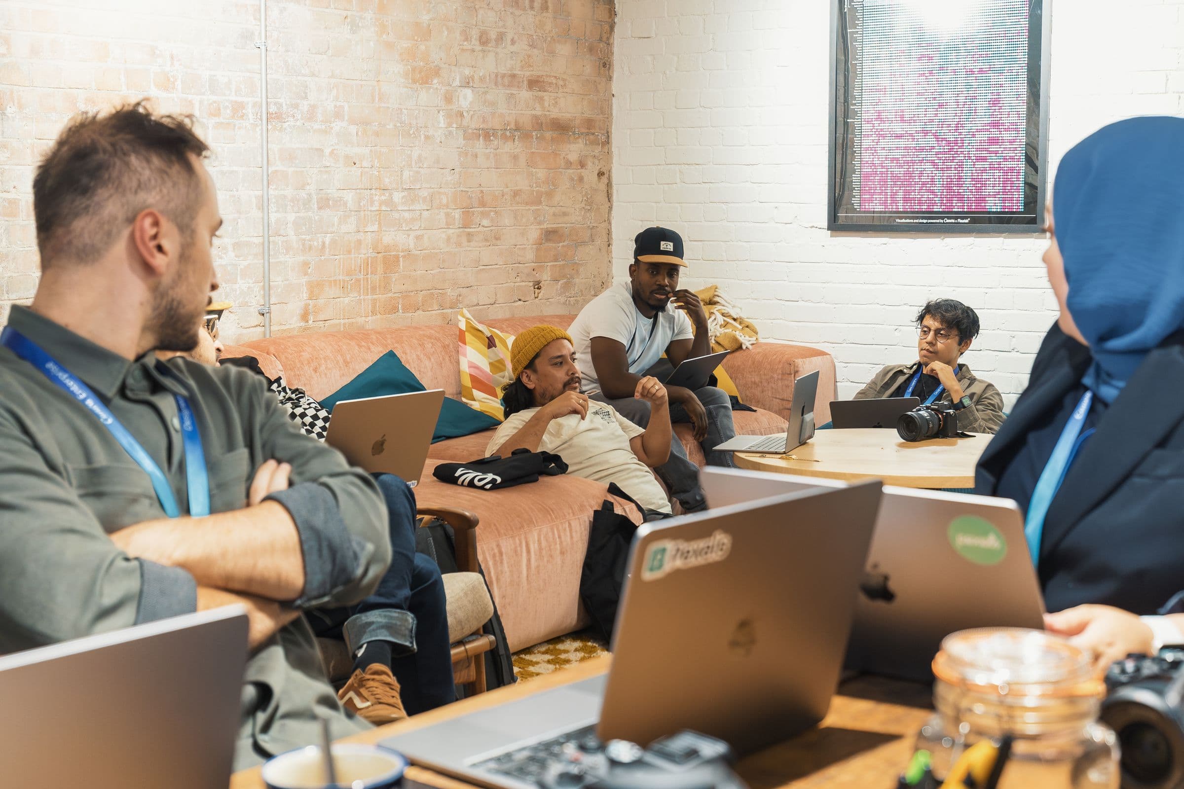 A technology team discussing a project in a working studio